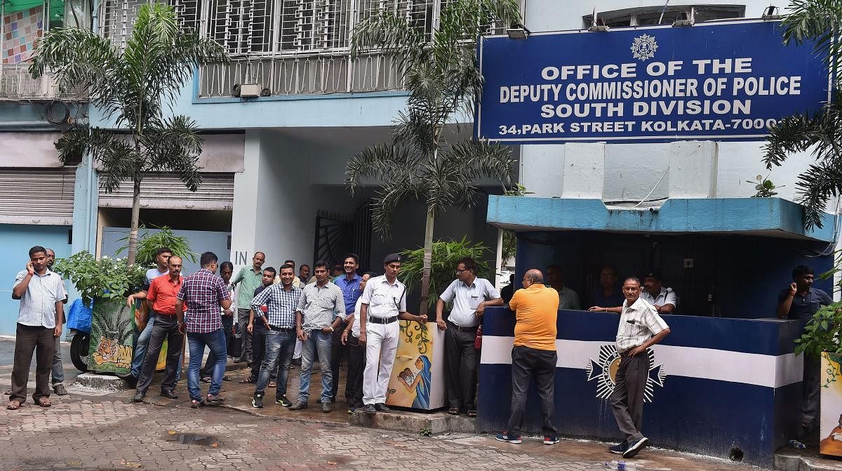 Police personnel in plain clothes seen outside the official residence of former Kolkata Police Commissioner Rajeev Kumar. PTI Photo