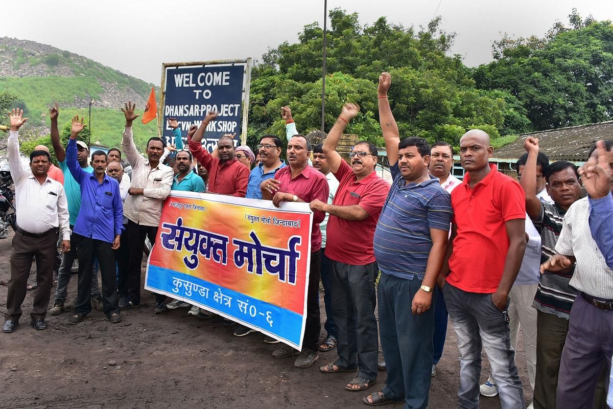 Employees of BCCL (Bharat Coking Coal Ltd) demonstrate during nationwide coal strike at Jharia in Dhanbad. (PTI Photo)
