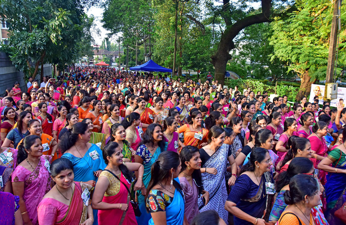 Women clad in saree take part in Saree Walk and Run at Gandhi Park in Mannagudda, Mangaluru, on Sunday.