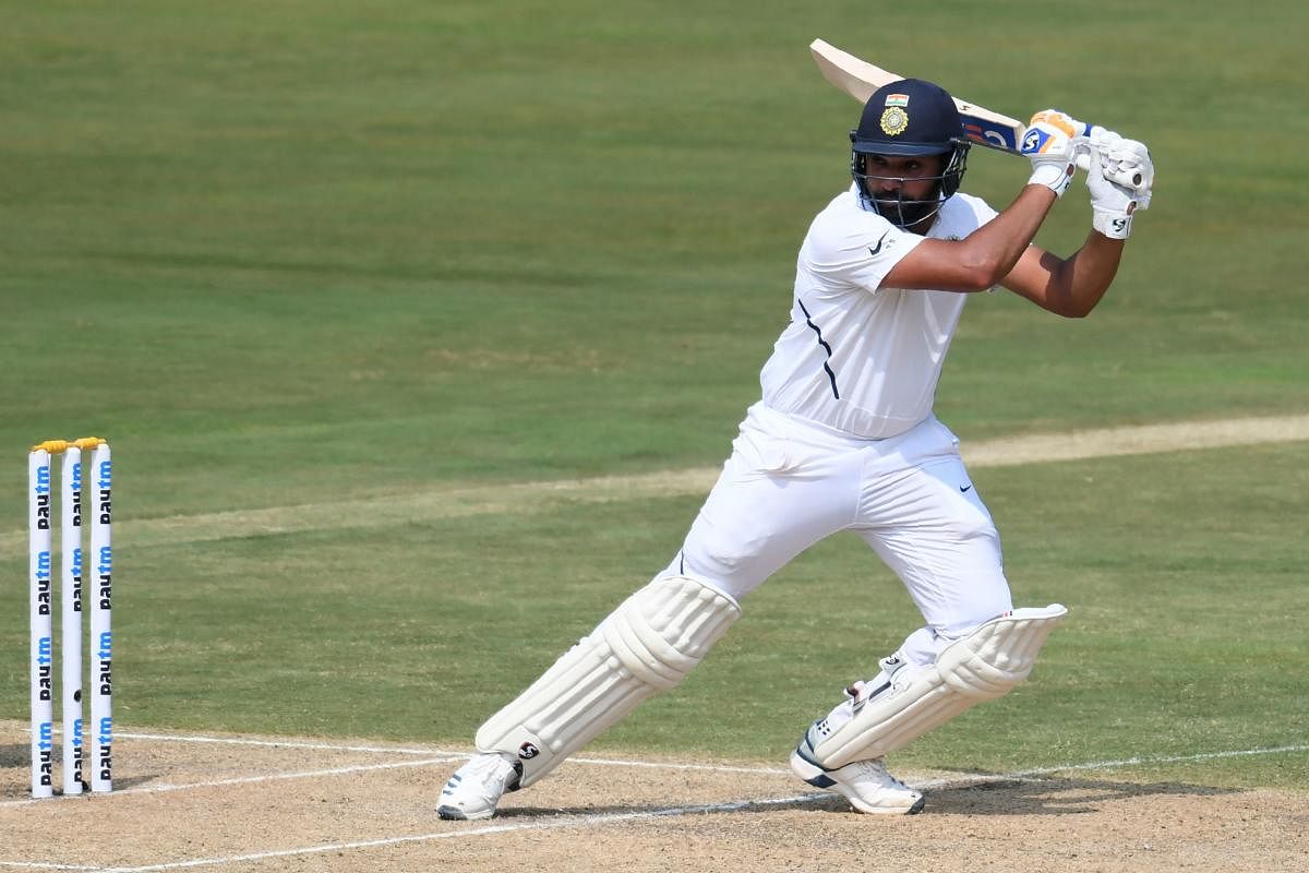Rohit Sharma cuts one to the fence en route his unbeaten 115 against South Africa on the opening day of the first Test in Visakhapatnam on Wednesday. AFP