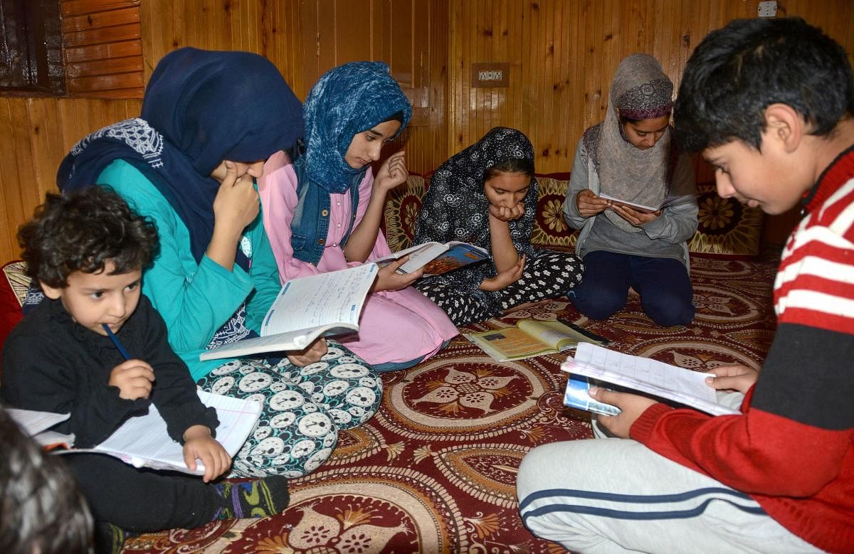  A group of students prepare for Class 10th board examinations, in Srinagar. (PTI Photo)
