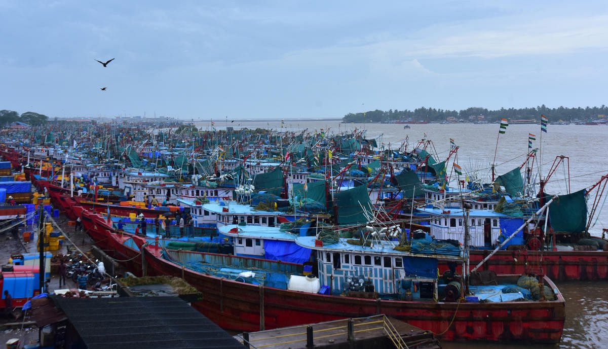 Fishing boats anchored at Old Port in Mangaluru, following Cyclone Kyarr in the Arabian Sea on Friday. DH Photo/Govindraj Javali
