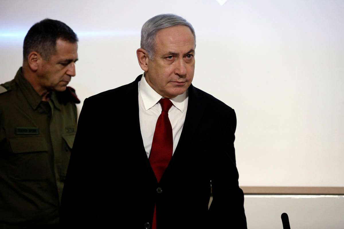 Israel's Prime Minister Benjamin Netanyahu and Israel's Chief of Staff Aviv Kochavi arrive to deliver a joint statement in Tel Aviv, Israel. Reuters