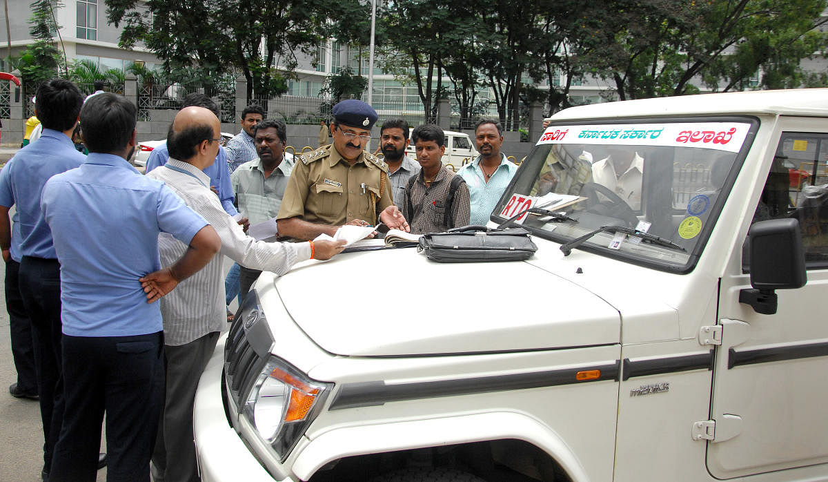 About 300 posts of transport inspectors are vacant, limiting drives to check vehicles that flout rules. DH FILE PHOTO