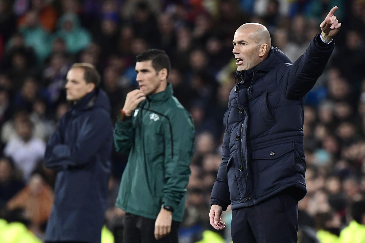 Real Madrid's French coach Zinedine Zidane gestures during the UEFA Champions League group A football match against Paris Saint-Germain FC. (AFP Photo)