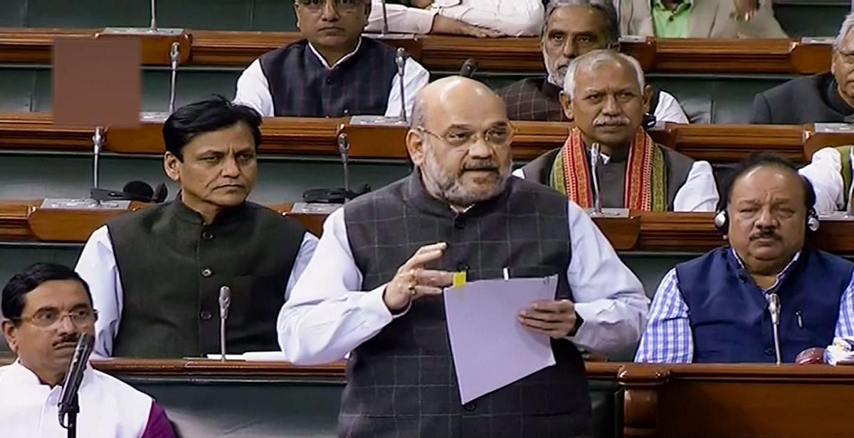 Union Home Minister Amit Shah speaks in the Lok Sabha during the Winter Session of Parliament. (PTI Photo)