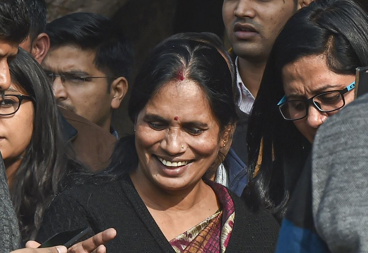 Nirbhaya rape case victim's mother smiles after the Supreme Court dismissed the plea of Akshay Thakur, one of the four convicts, demanding review of his death penalty. Photo: PTI/File