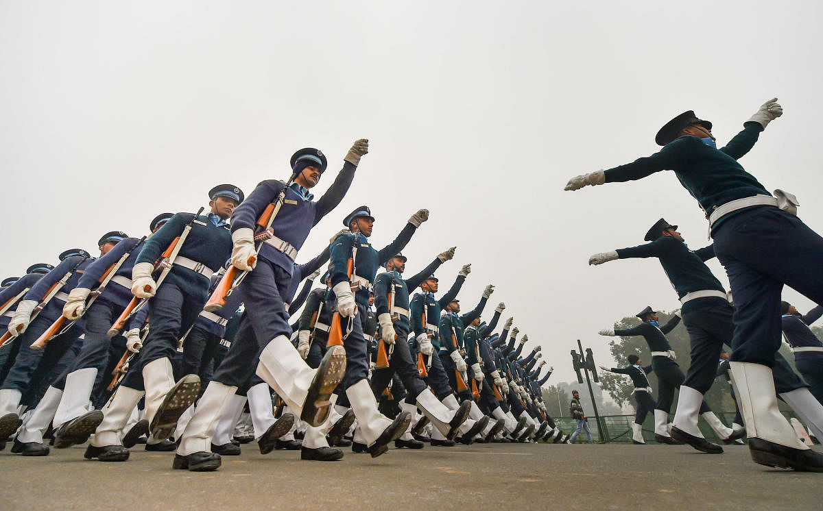 Indian Air Force personnel perform a march-past as part of rehearsal for the 71st Republic Day, in New Delhi, Saturday, Dec. 28, 2019. (PTI Photo)