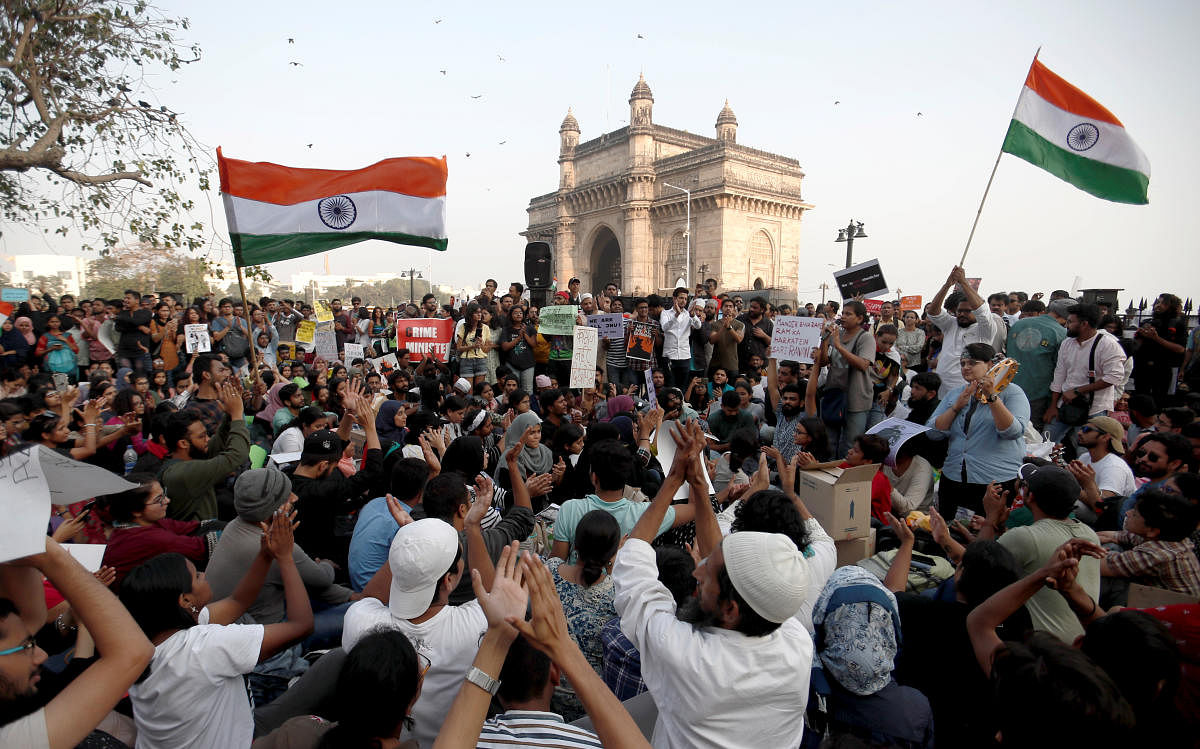 the students of New Delhi's Jawaharlal Nehru University (JNU), outside the Gateway of India monument in Mumbai. REUTERS