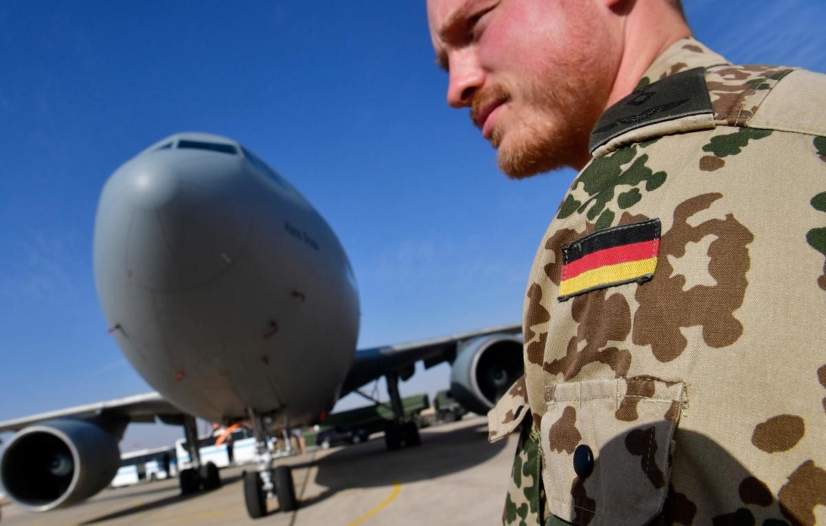 German contingent standing next to a German air force Airbus A-310 refuelling tanker aircraft at the Al Azraq air base in Jordan. (AFP photo)