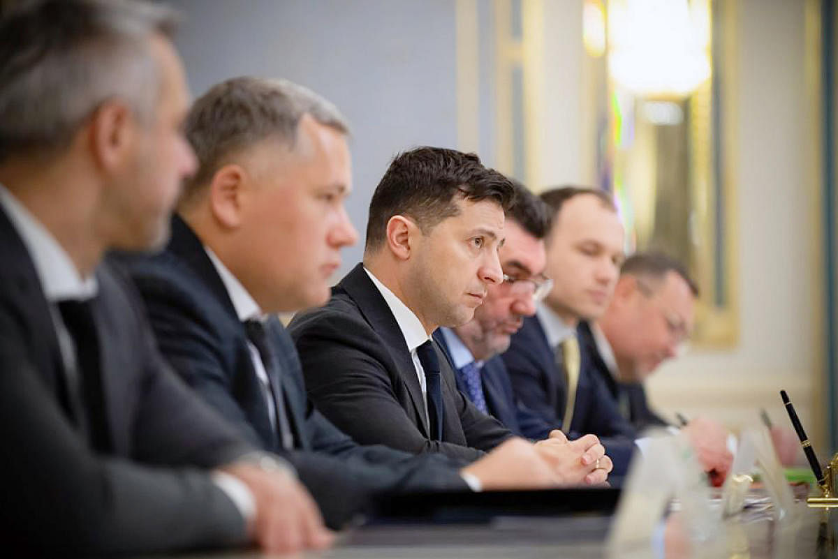 This handout picture taken and released by the Ukrainian presidential press service on January 20, 2020 shows the President Volodymyr Zelensky (3L) during his talks with Iran's Minister of Roads and Urban Development (not seen) in Kiev. - Ukraine insisted