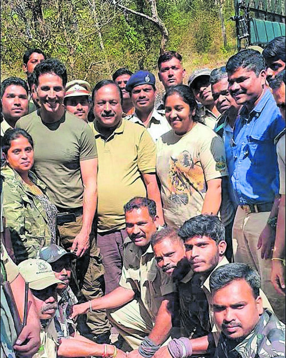 Bollywood actor Akshay Kumar seen with Project Tiger director T Balachandra and Forest department employees during his visit to Bandipur on Thursday.