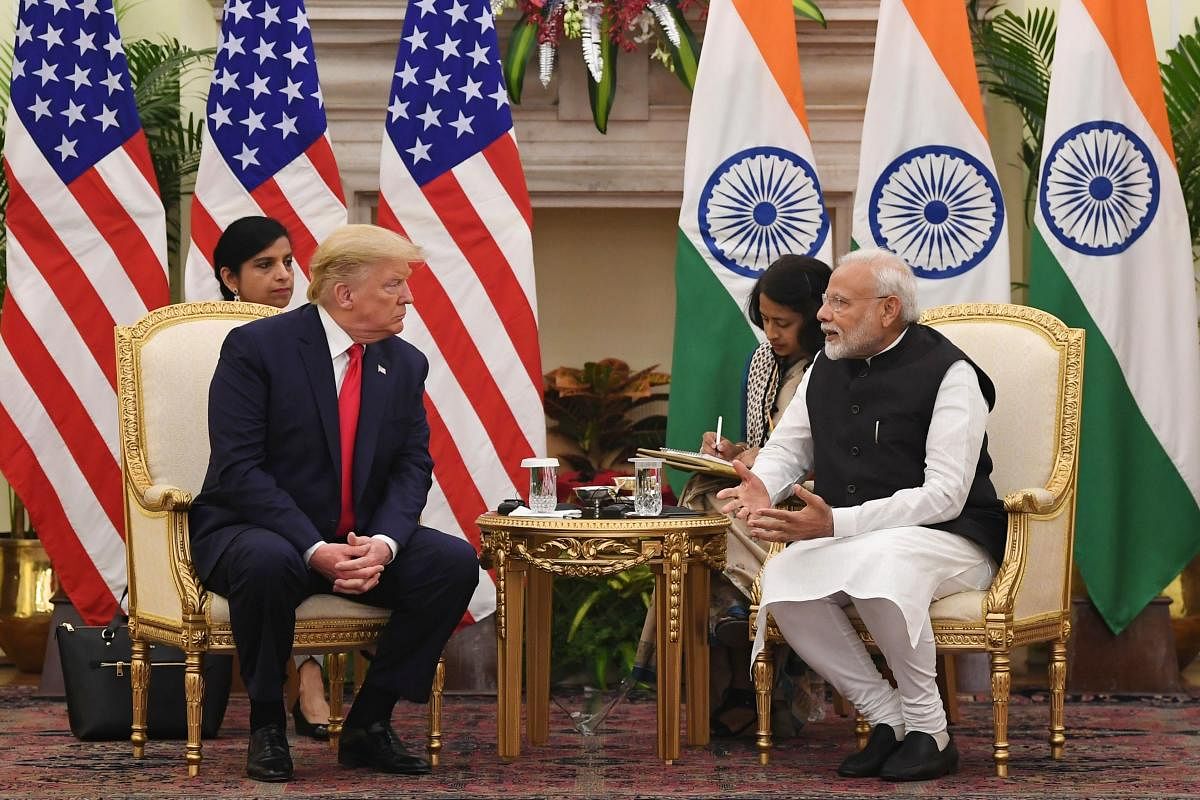 India's Prime Minister Narendra Modi (R) speaks during a meeting with US President Donald Trump (Twitter image/MEAIndia)