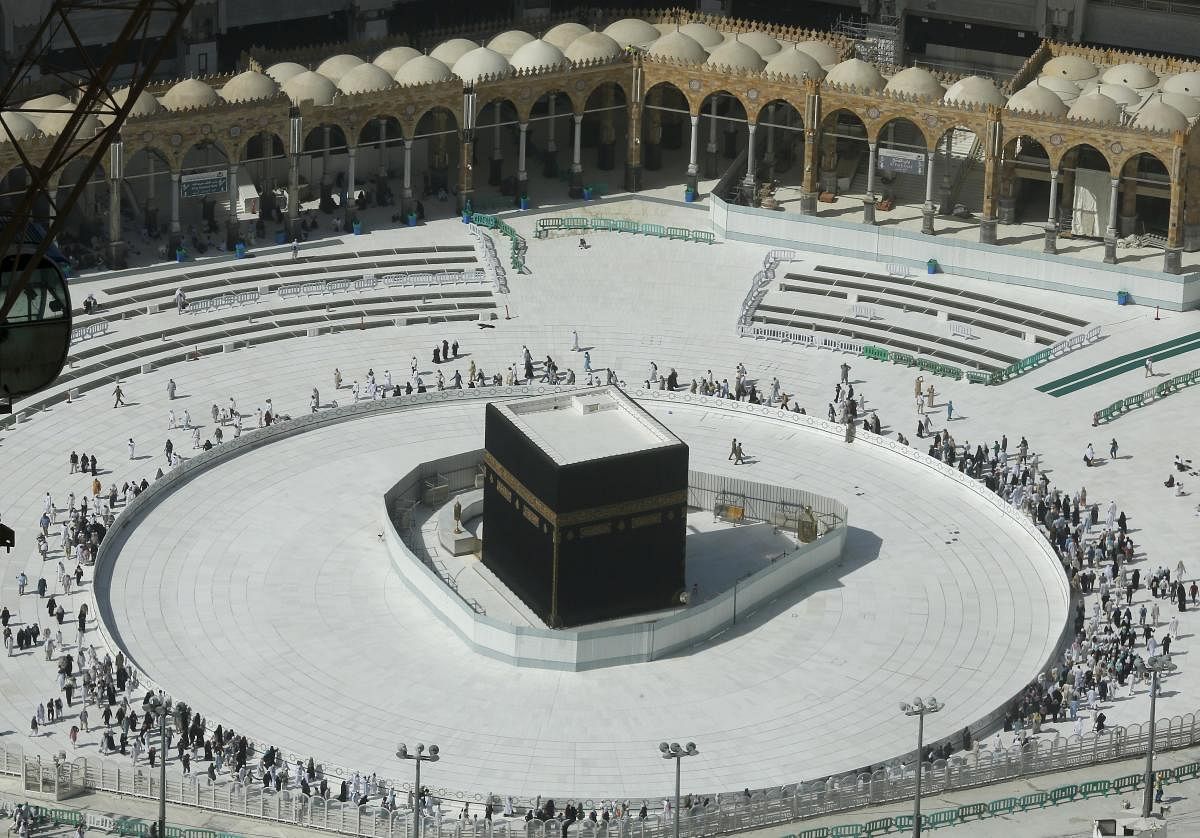 Muslims circumambulate the Kaaba, the cubic building at the Grand Mosque, in the Muslim holy city of Mecca, Saudi Arabia. (AP/PTI Photo)