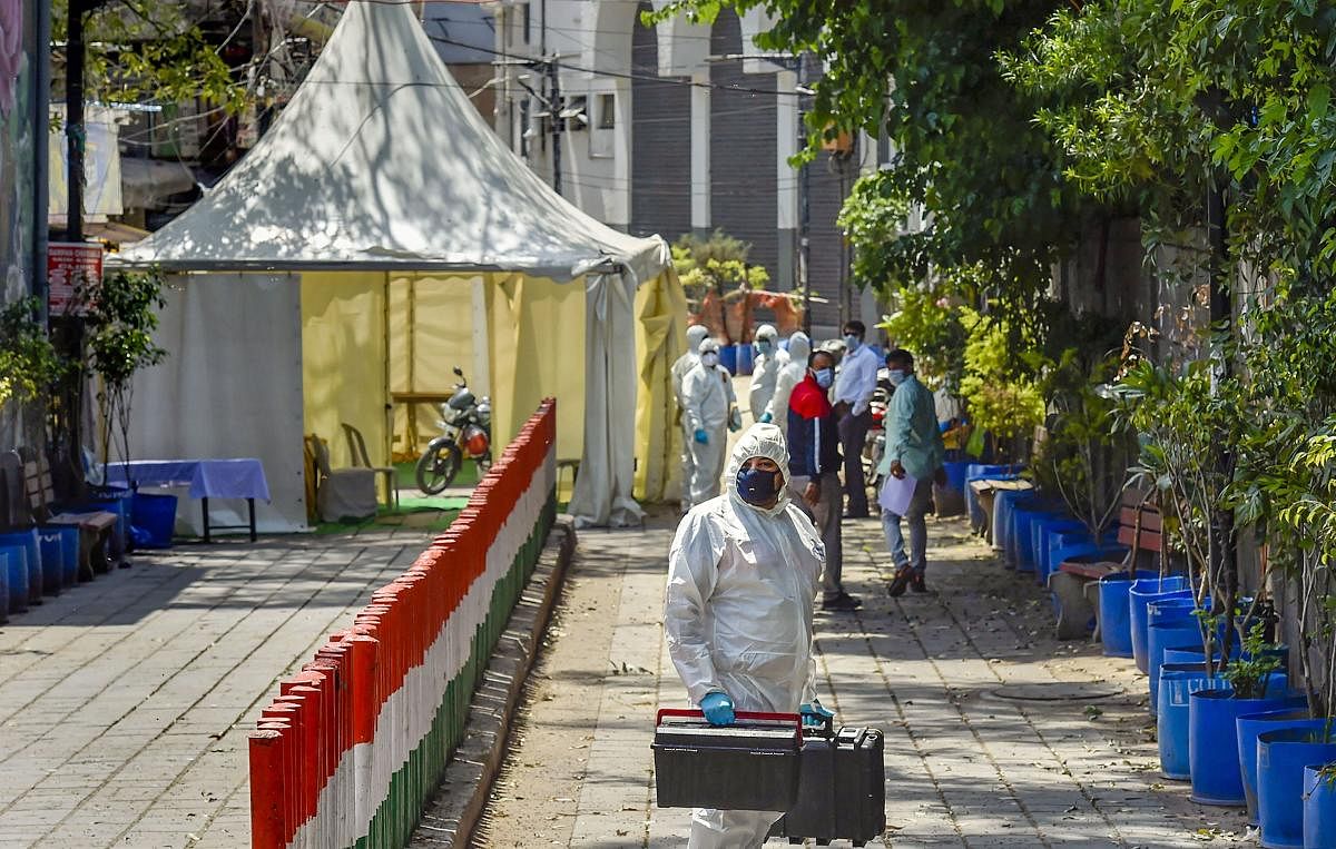 Forensic officials arrive at Nizamuddin Markaz to conduct an investigation, during the nationwide lockdown to curb the spread of coronavirus. PTI
