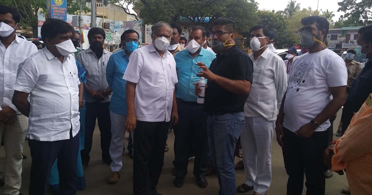 Minister S Suresh Kumar speaking to the officials during his visit to Gauribidanur.