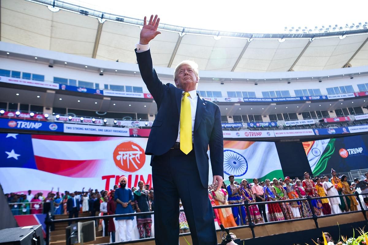 US President Donald Trump waving after attending the 'Namaste Trump' rally at Sardar Patel Stadium in Motera on the outskirts of Ahmedabad. (AFP Photo)