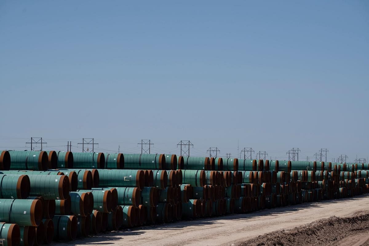 Oil pipes remain in storage on April 24, 2020 near Odessa, Texas. - Oil and gas is one of the main economic drivers of this area, and the industry has taken a hit after the price of oil dropped below zero earlier this week due to decline in demand from th