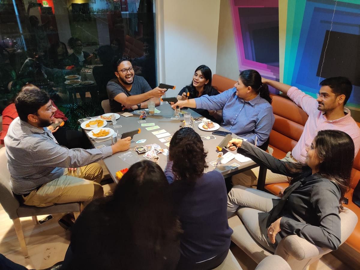A board game session at Creeda Cafe in Mumbai in pre-Corona days. (within text)