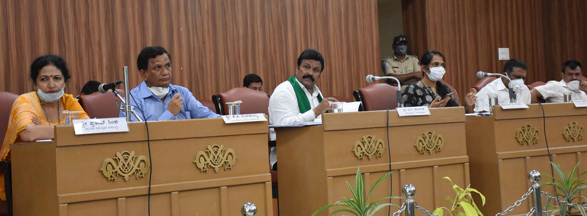 Agriculture Minister B C Patil chairs a progress review meeting of the department in Madikeri on Tuesday.