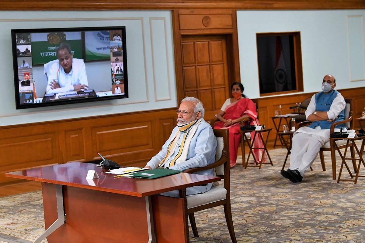 Prime Minister Narendra Modi interacts with the Chief Ministers of various states via video conferencing, to discuss COVID-19 situation, in New Delhi, Monday, May 11, 2020. (PTI