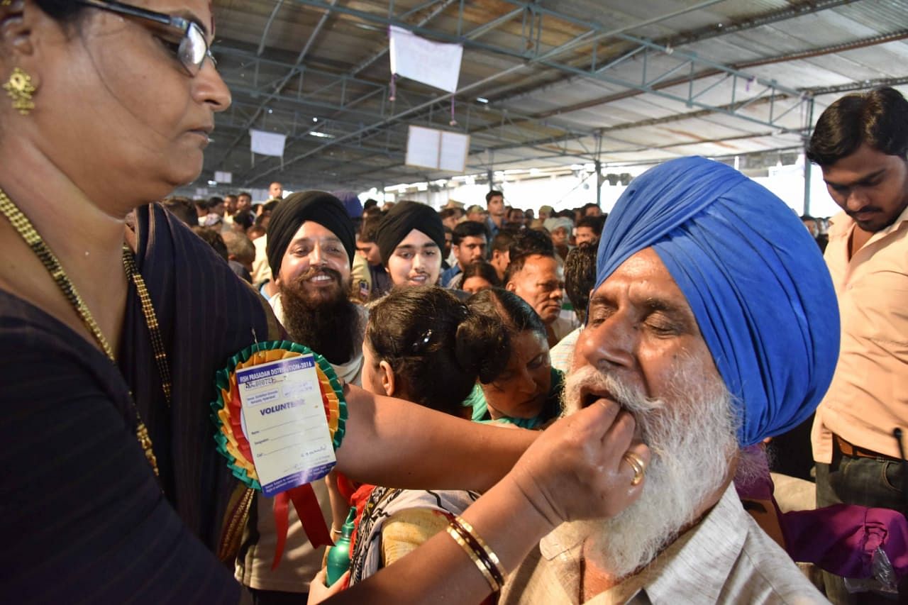 File photo: Bathini family members distributing Fish prasadam in Hyderabad