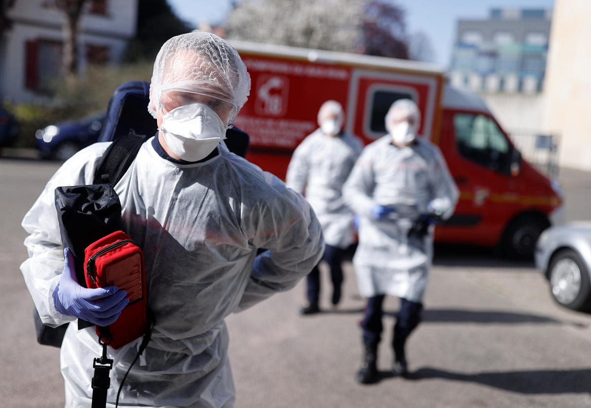 Firefighters ambulance crew members of the Departmental Fire and Rescue Service (SDIS 67) arrive on site for a rescue operation in Strasbourg as the spread of the coronavirus disease (COVID-19) continues in France, March 28, 2020. Credit: Reuters Photo