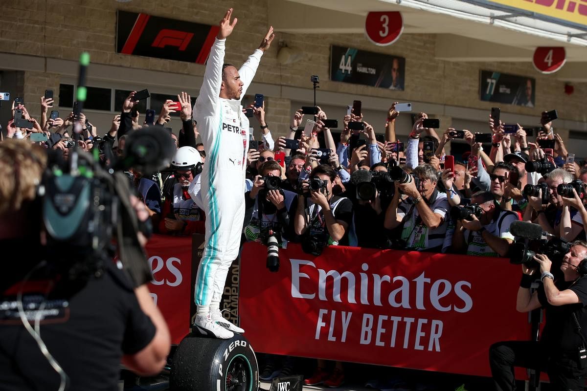 Formula One World Drivers Champion Lewis Hamilton of Great Britain and Mercedes GP celebrates in parc ferme during the F1 Grand Prix of USA at Circuit of The Americas on November 03, 2019. AFP Photo