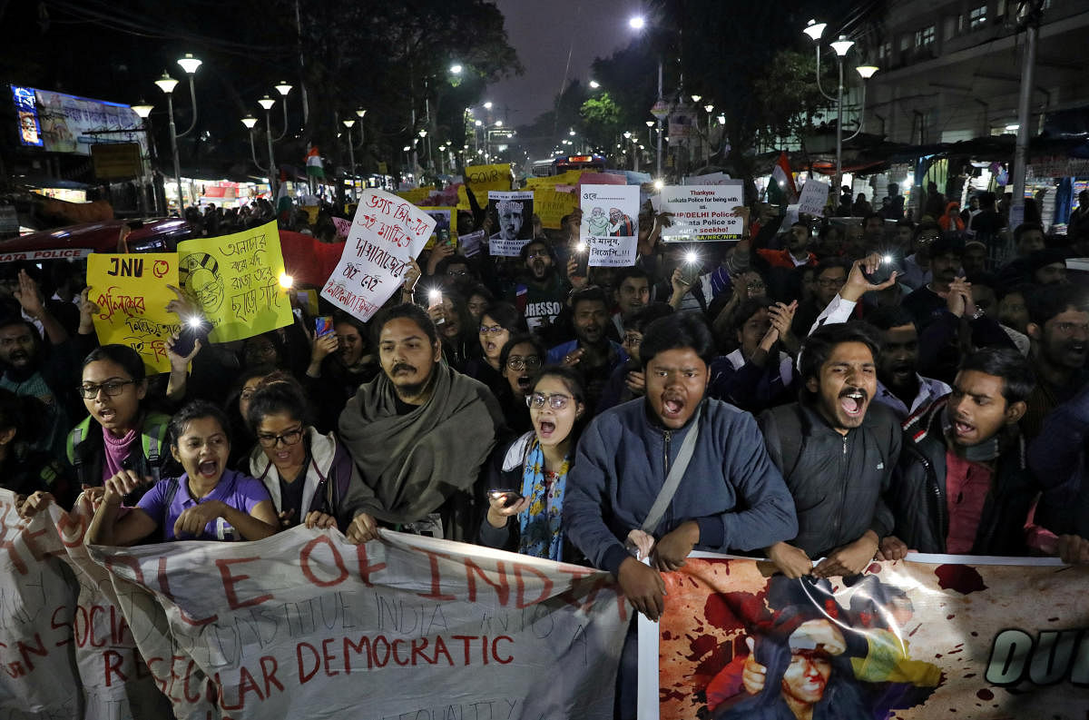 Demonstrators shout slogans during a protest against the attacks on the students of New Delhi's Jawaharlal Nehru University on Sunday, in Kolkata. Reuters