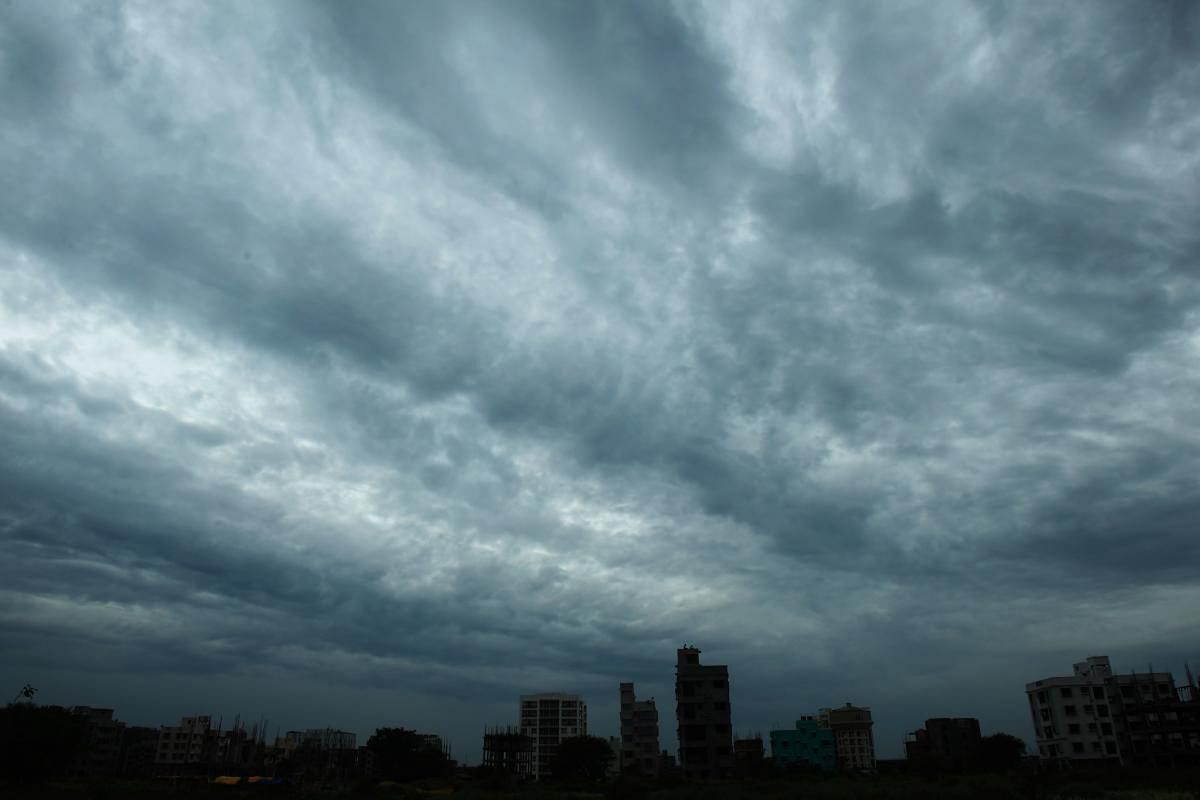 Rain clouds loom over a Kolkata on May 19, 2020, as Cyclone Amphane barrels towards India's eastern coast. AFP