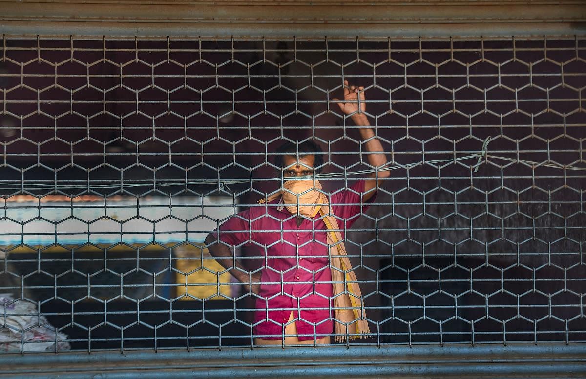  A labourer seen at Koyambedu market on the eve of May Day or Labour Day, in Chennai, Thursday, April 30, 2020. Credit: PTI Photo