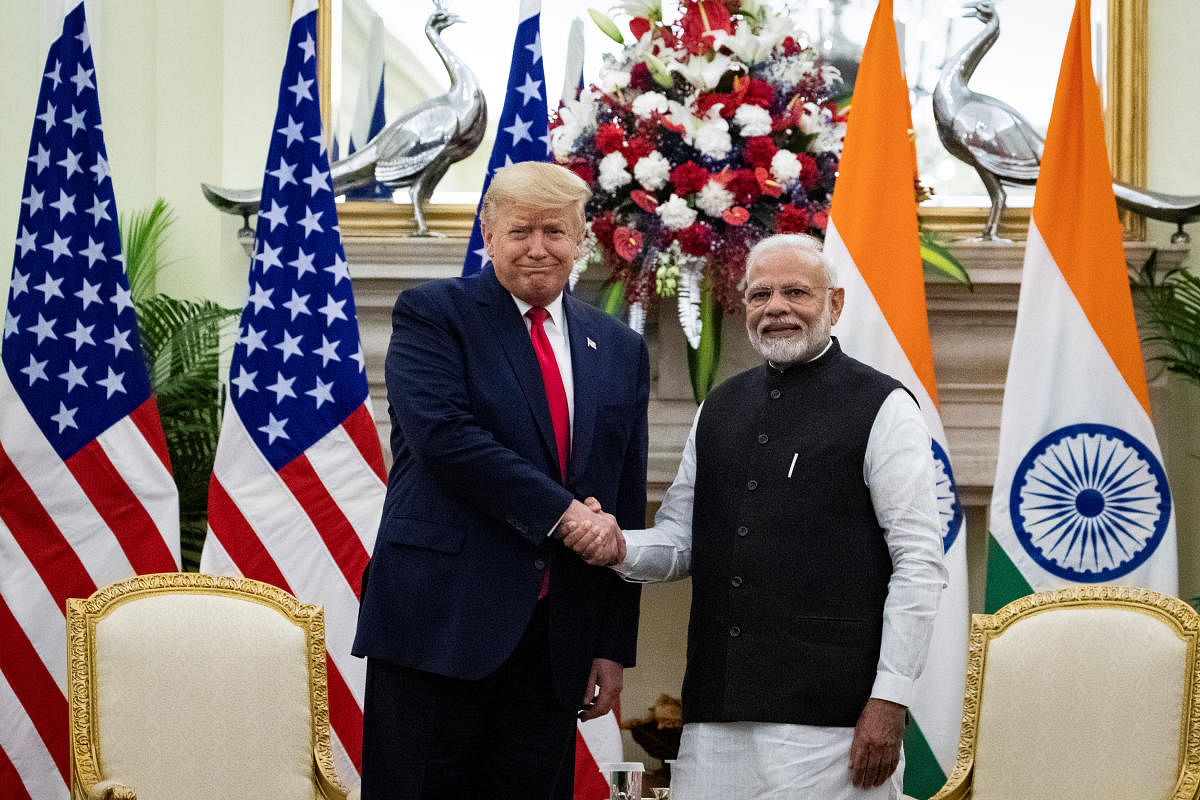 U.S. President Donald Trump and Indian Prime Minister Narendra Modi shake hands during a meeting at Hyderabad House in New Delhi, India, February 25, 2020. Credit: Reuters Photo