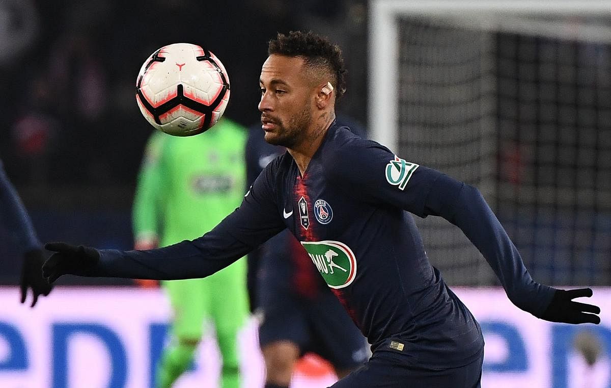Paris Saint-Germain's Brazilian forward Neymar controls the ball during the French Cup round of 32 football match between Paris Saint-Germain (PSG) and Strasbourg (RCS) at the Parc des Princes stadium in Paris. AFP.