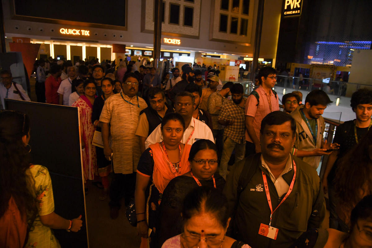 People line up for Kannada retro Shankar Nag film ‘Minchina Oota’, at 12th BIFFES, at Orion Mall in Bengaluru Photo/ B H Shivakumar