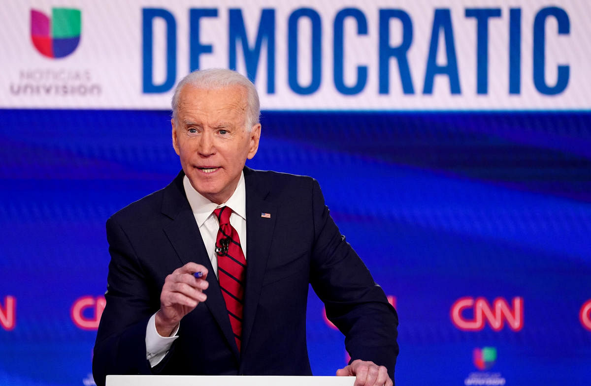 Democratic US presidential candidate and former Vice President Joe Biden speaks at the 11th Democratic candidates debate of the 2020 US presidential campaign in Washington. Reuters