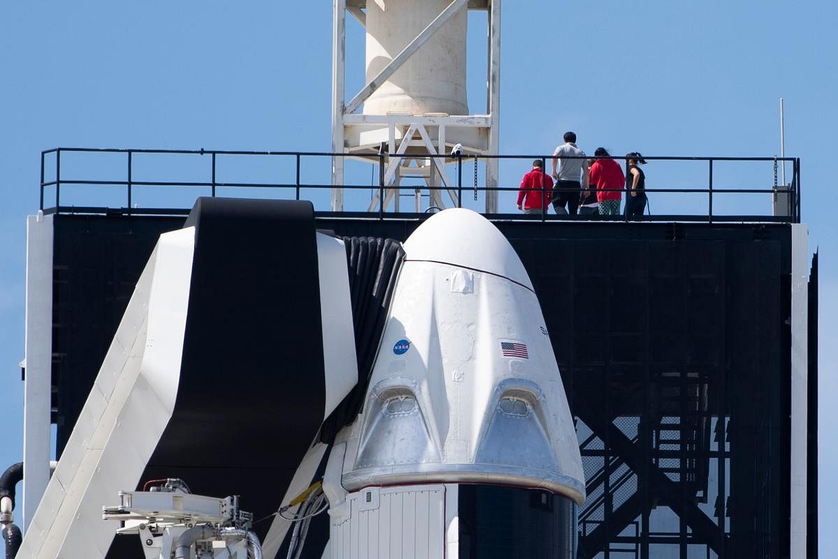  In this file photo taken on March 01, 2019 The SpaceX Falcon 9 rocket with the unmanned Crew Dragon capsule on its nose sits at Kennedy Space Center in Florida. AFP Photo