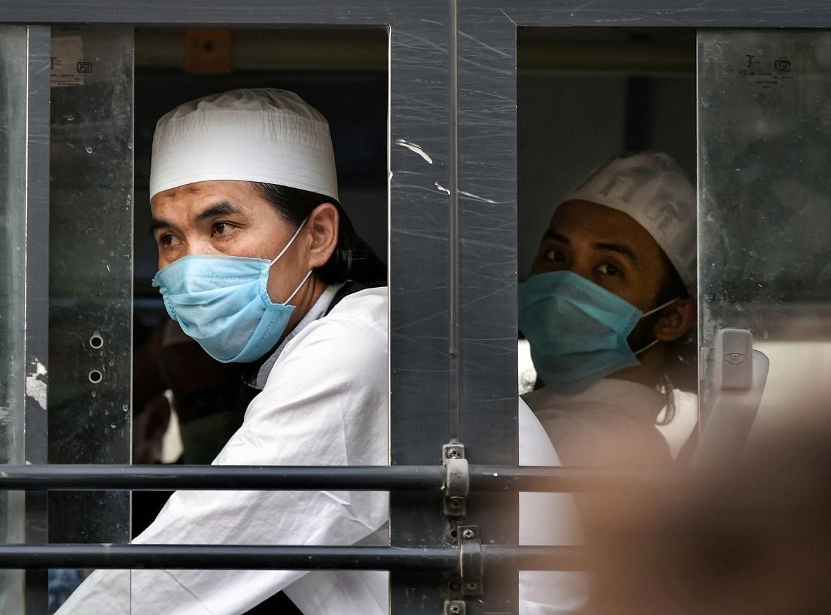 Members of the Tablighi Jamaat leave in a bus from LNJP hospital for the quarantine centre during the nationwide lockdown, in wake of the coronavirus pandemic, in New Delhi, Tuesday, April 21, 2020. (PTI Photo)