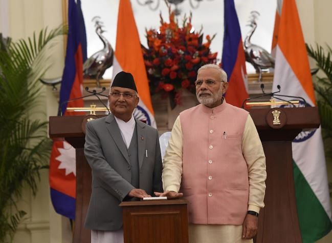 Indian Prime Minister Narendra Modi (R) and Prime Minister of Nepal K.P. Sharma Oli look on during the inauguration of India-Nepal petroleum products pipeline and the Integrated Check Post (ICP), at Hyderabad house, in New Delhi on April 7, 2018 (AFP File Photo)