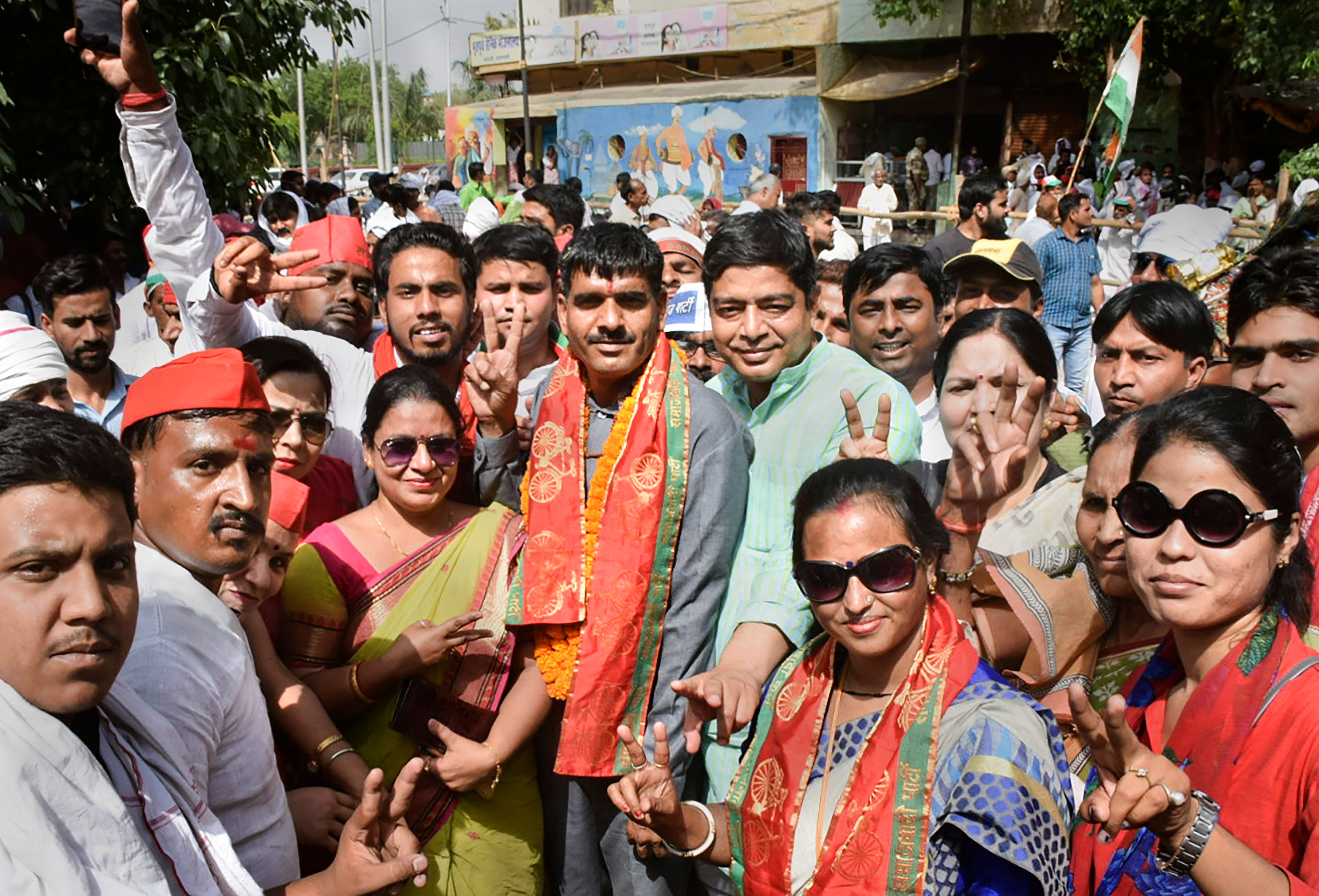 Dismissed BSF constable Tej Bahadur Yadav with supporters after he was fielded as Samajwadi Party-Bahujan Samajwadi Party alliance's Varanasi seat candidate for Lok Sabha polls, in Varanasi (PTI file photo)