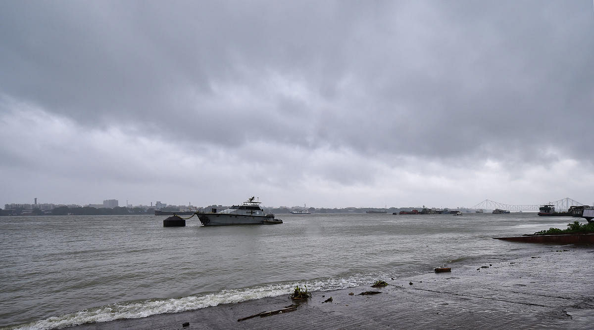 Waves crash at the bank of Ganga river in the backdrop of dark clouds covering the sky ahead of cyclone 'Amphan' landfall, in Kolkata, Wednesday, May 20, 2020. (PTI)