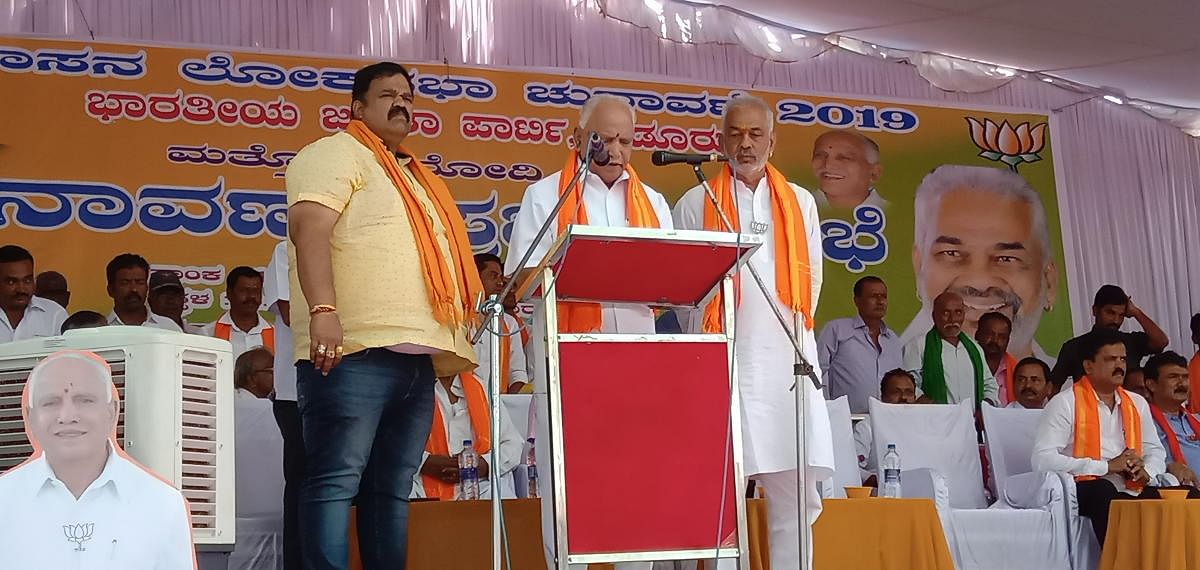 State BJP president and former chief minister B S Yeddyurappa speaks at a public campaign meeting in Kadur.