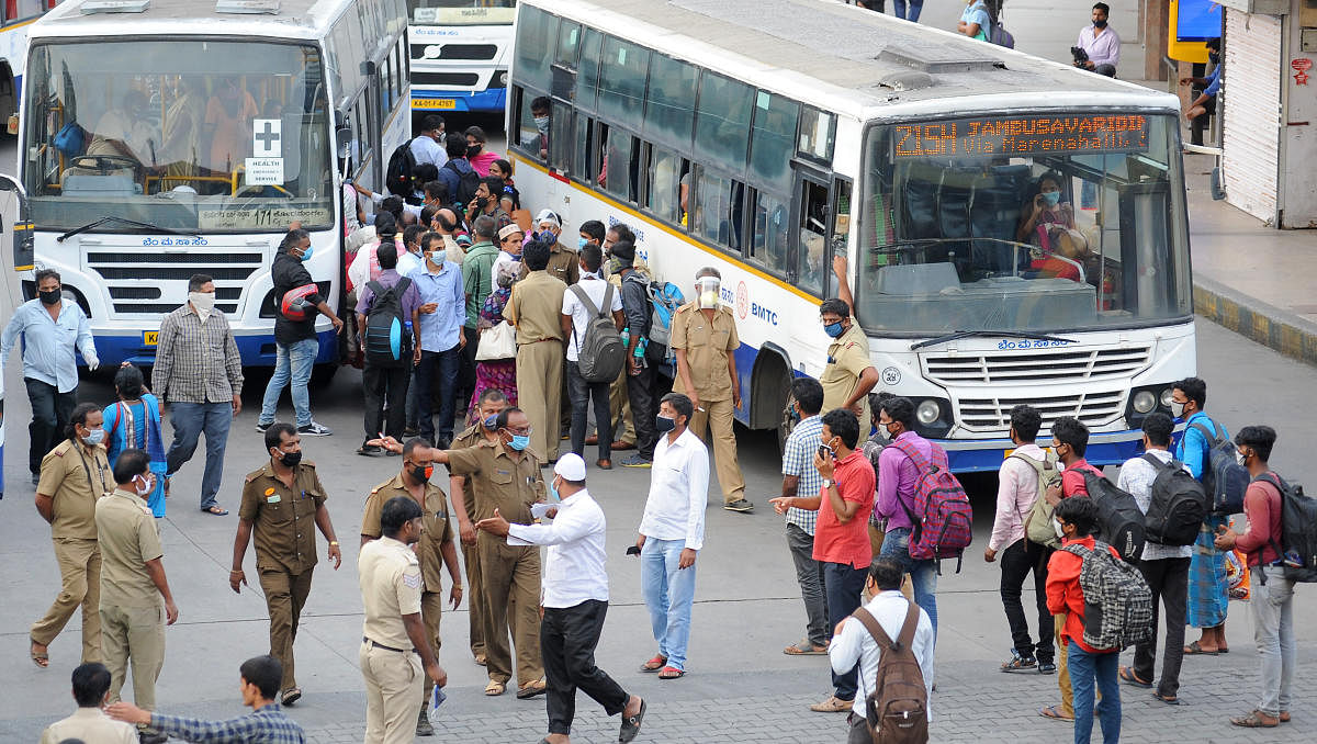 Anxious passengers wait for BMTC buses at Majestic as the city transporter resumed service on Tuesday. DH PHOTO/Pushkar V