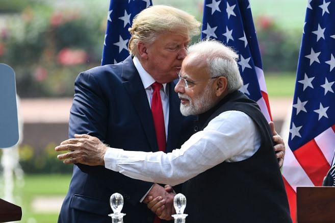 Prime Minister Narendra Modi (R) and US President Donald Trump hug each other after their joint press statement (AFP File Photo)
