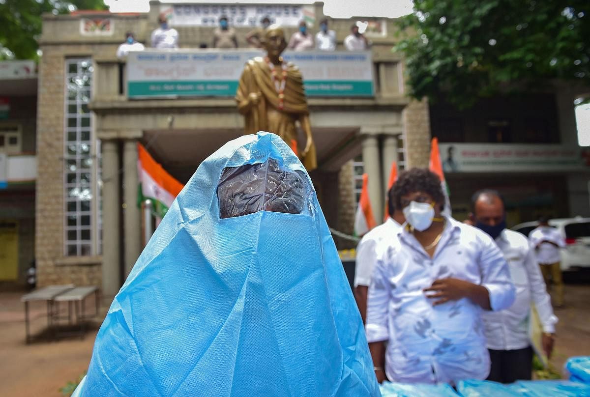 A person wearing PPE kit (PTI Photo)