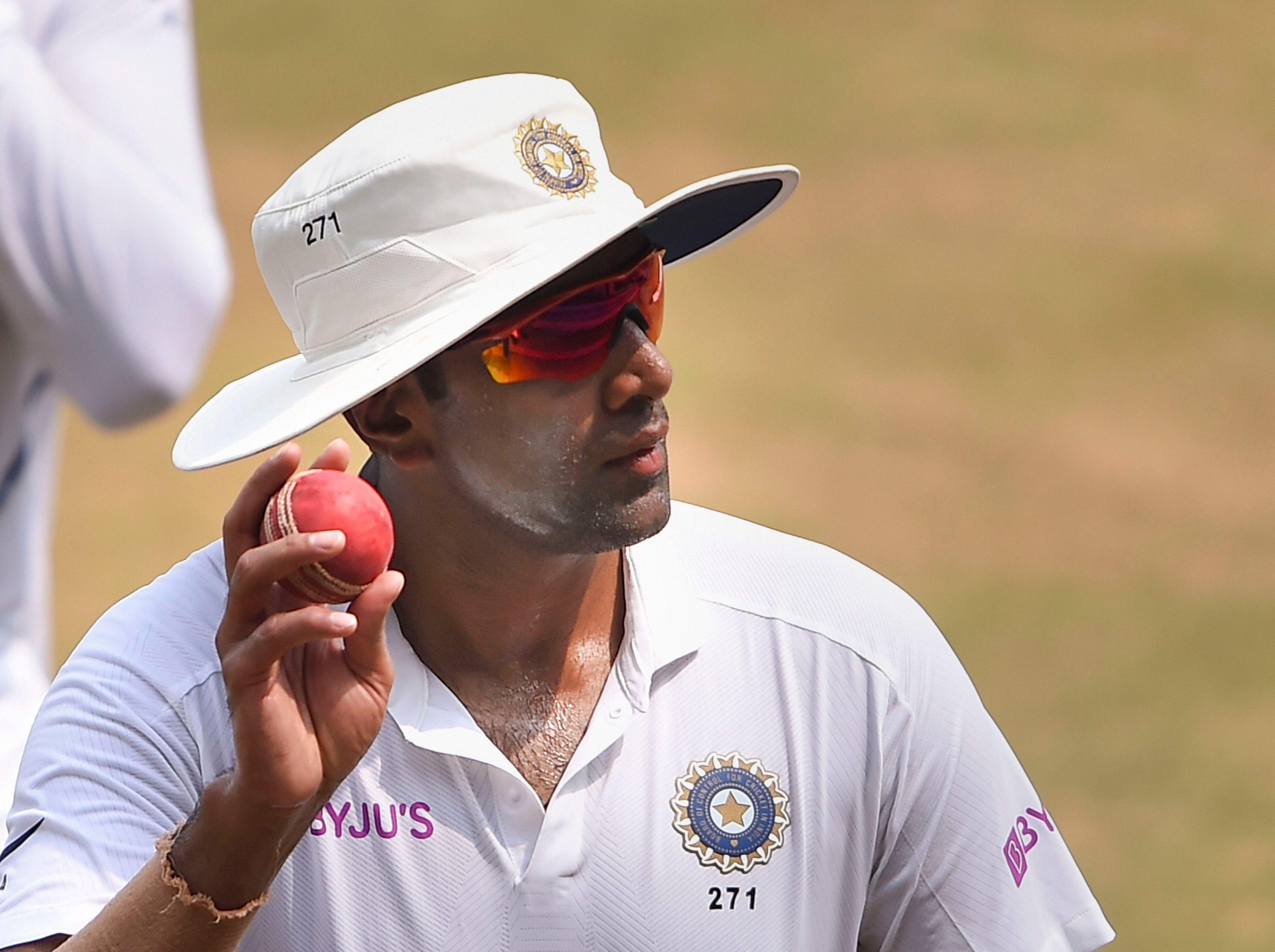  India's Ravichandran Ashwin holds the ball while leaving the ground at the end of the first innings of South Africa (PTI file photo)