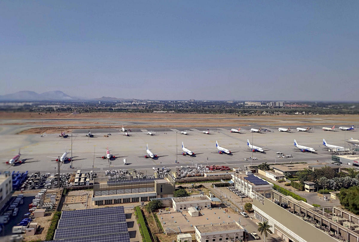 Bengaluru: Aeroplanes are seen parked near a runway of BLR Airport, during a nationwide lockdown imposed in the wake of coronavirus pandemic, in Bengaluru, Wednesday, April 8, 2020. (PTI Photo)(PTI08-04-2020_000276B)