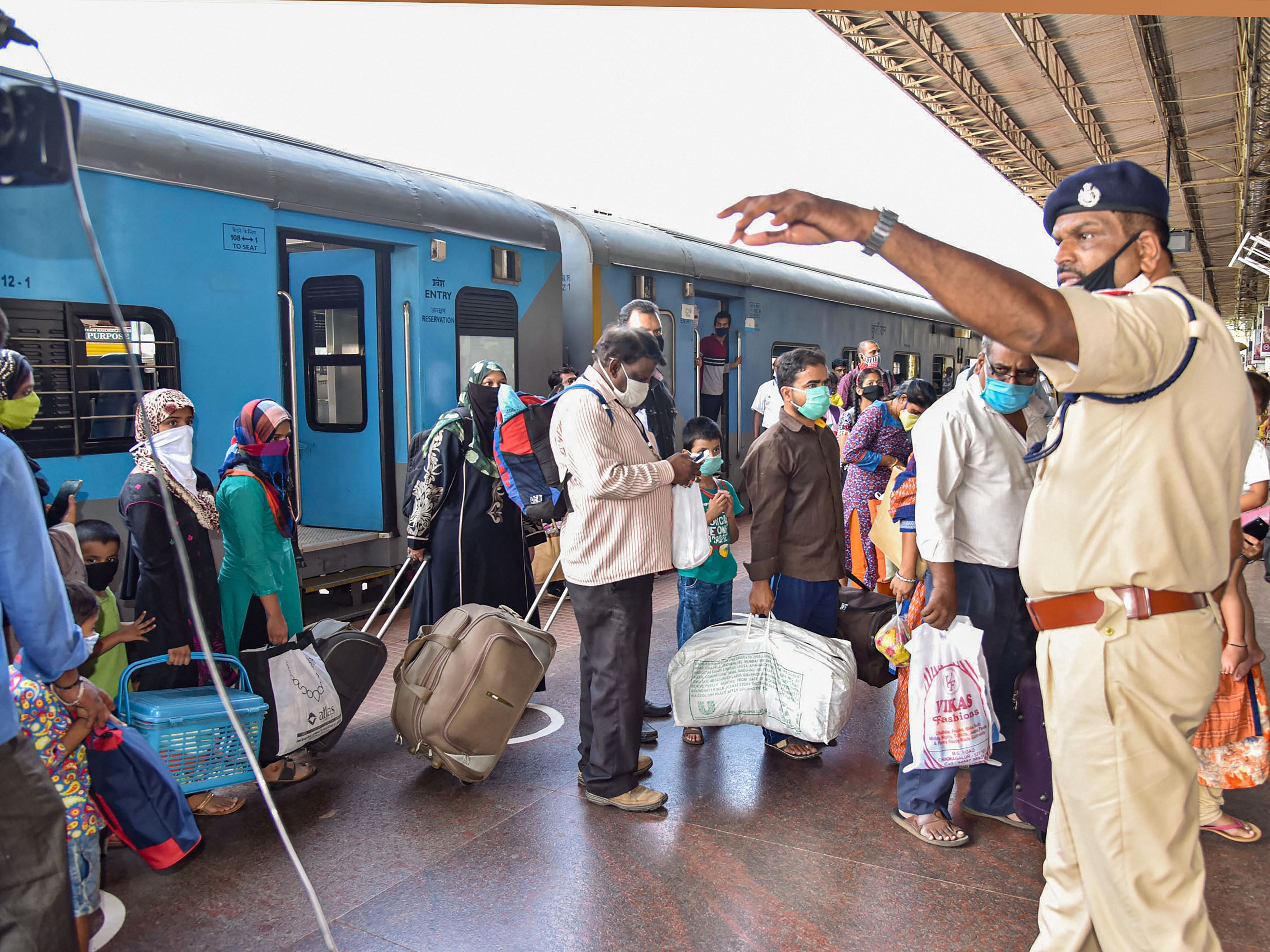 The advice to people to not panic comes amid easing of restrictions with limited rail and air travel set to resume. (Credit: PTI Photo)
