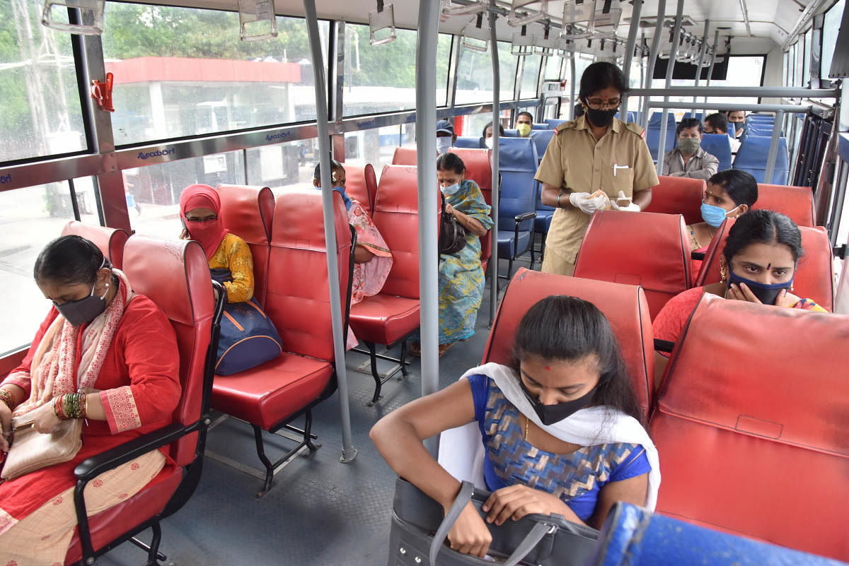 Passengers ensure social distancing in a BMTC bus in Bengaluru.