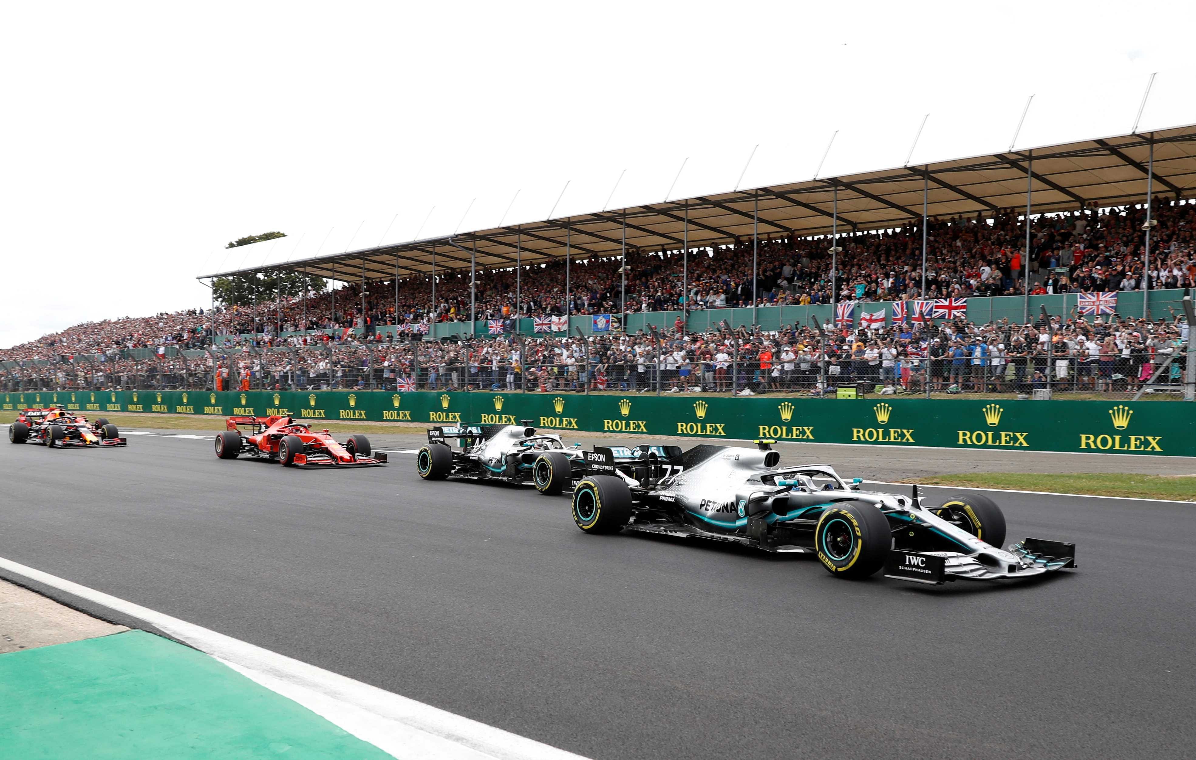 FILE PHOTO: Formula One F1 - British Grand Prix - Silverstone Circuit, Silverstone, Britain - July 14, 2019 Mercedes' Valtteri Bottas, Mercedes' Lewis Hamilton and Ferrari's Charles Leclerc in action during the race. (Credit: Reuters photo)