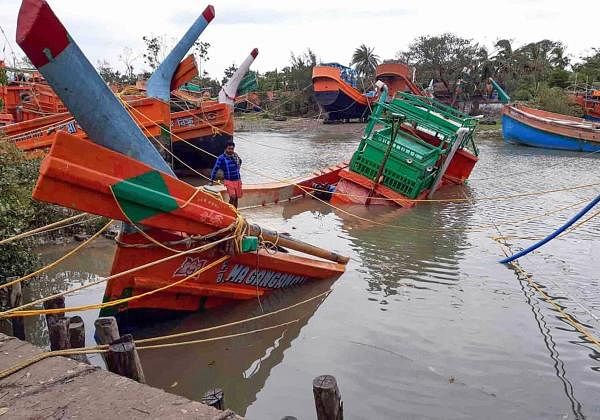 Damaged boats are seen partially submerged, in the aftermath of Cyclone Amphan, near Sunderbans area in South 24 Paraganas district of West Bengal, Friday, May 22, 2020. (PTI Photo)